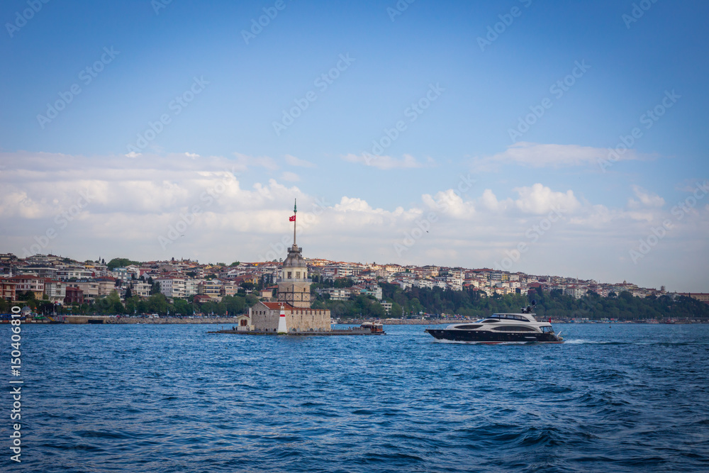 The boat approaching Maiden Tower (Kiz Kulesi) in Istanbul, Turkey.