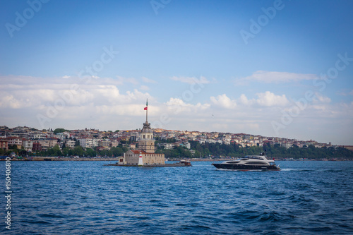 The boat approaching Maiden Tower (Kiz Kulesi) in Istanbul, Turkey.