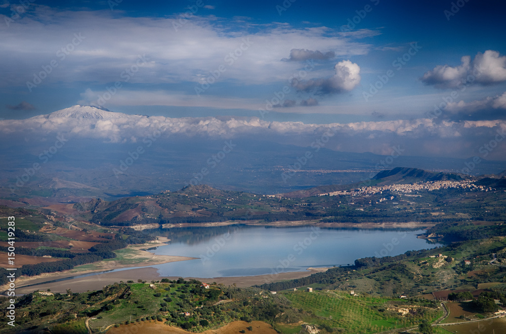 sicilia, pozzillo lake, and mount etna in backgroud