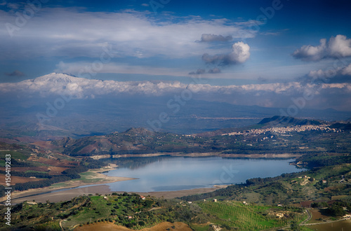 sicilia, pozzillo lake, and mount etna in backgroud