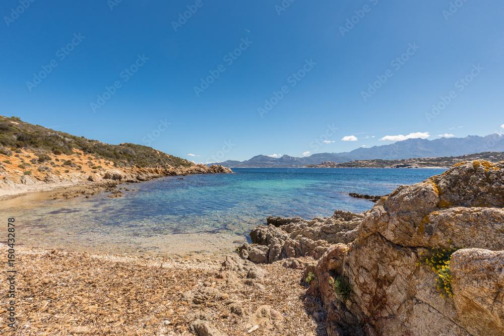 Beach and and rocky coastline at Revellata in Corsica