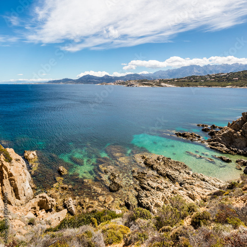 Turquoise sea and rocky coastline at Revellata in Corsica