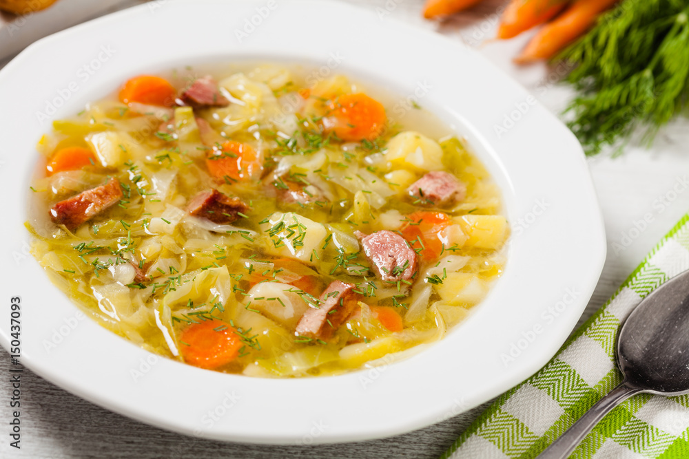 Homemade cabbage soup, cooked on smoked ribs.