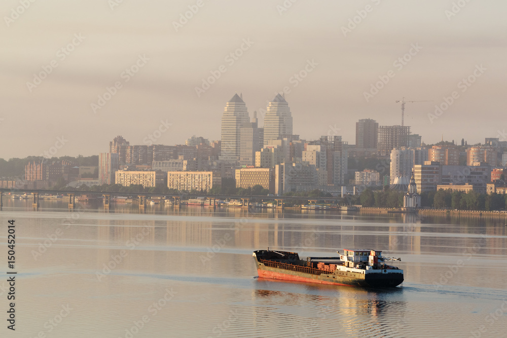 Naklejka premium Ship sailing on the river in the morning at dawn I