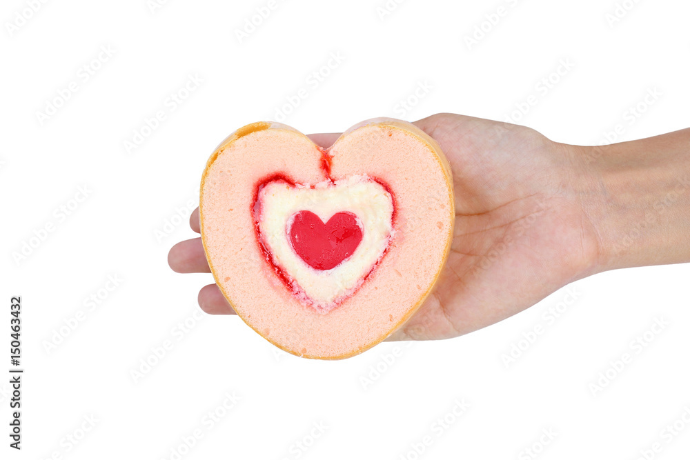 Woman hands holding Heart jam roll cakes on white background. Woman hands holding Heart jam roll cakes on white background.