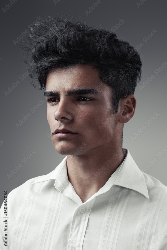 Close up portrait of a very handsome man with black hair Close up portrait of a very handsome man with black hair