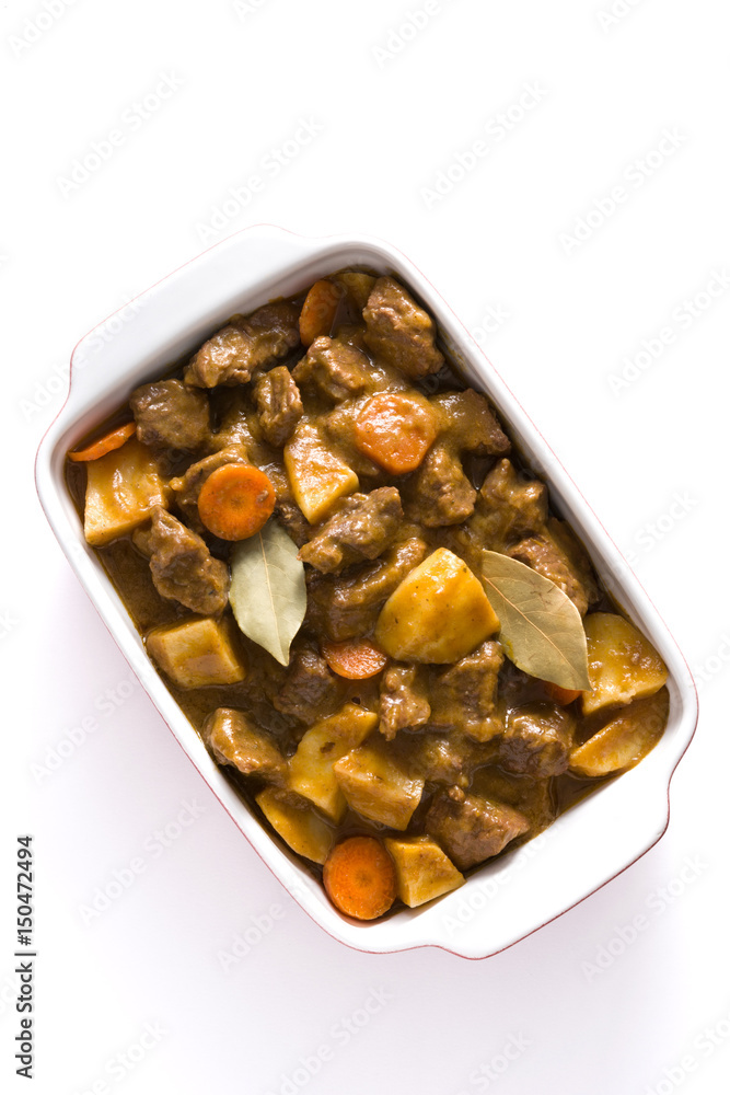 Beef meat stewed with potatoes, carrots and spices in ceramic pot isolated on white background.Top view
Beef meat stewed with potatoes, carrots and spices in ceramic pot isolated on white background.Top view