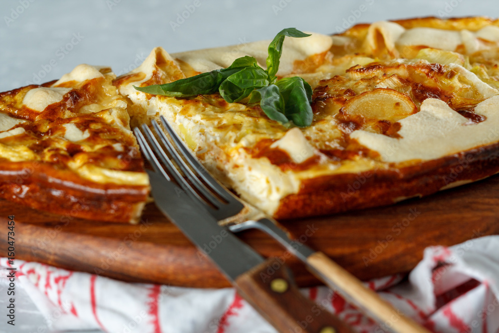 Homemade French open cake with leek and cheese. Quiche. Homemade French open cake with leek and cheese. Quiche.