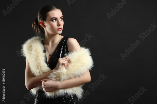 Girl in a dress  and a fur coat
