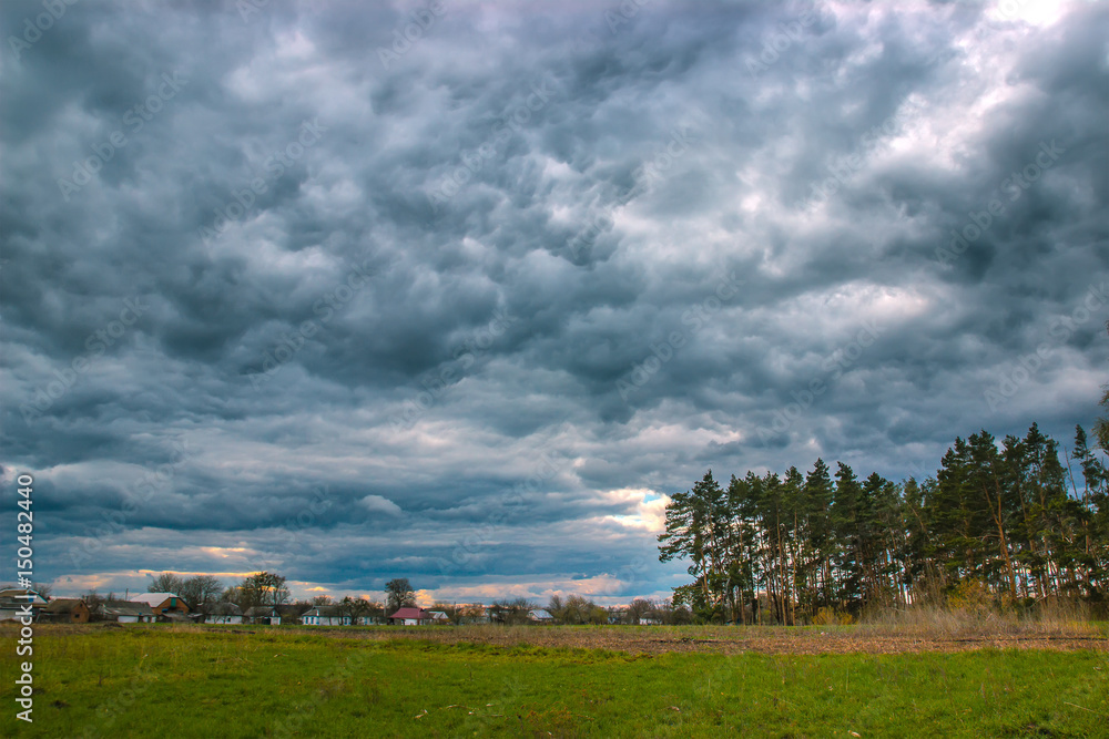 Time lapse storm clouds moving over the field Time lapse storm clouds moving over the field