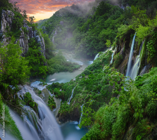 Fototapeta Naklejka Na Ścianę i Meble -  Fairytale, misty morning over waterfalls in Plitvice park, Croatia