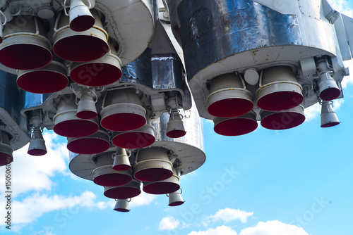Missile engine first step of space rocket. Close up. On sky background © Denis Starostin