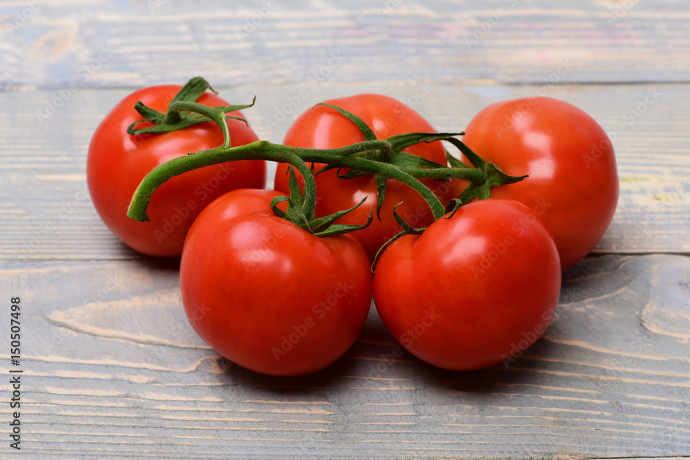 Vegetable. Red ripe tomato plant on branch Vegetable. Red ripe tomato plant on branch