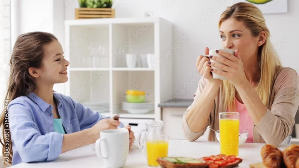 happy family having breakfast at home kitchen happy family having breakfast at home kitchen