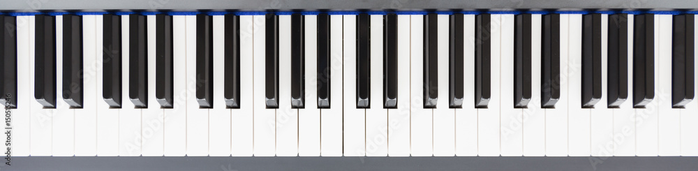 Fototapeta Top view of blank piano keys