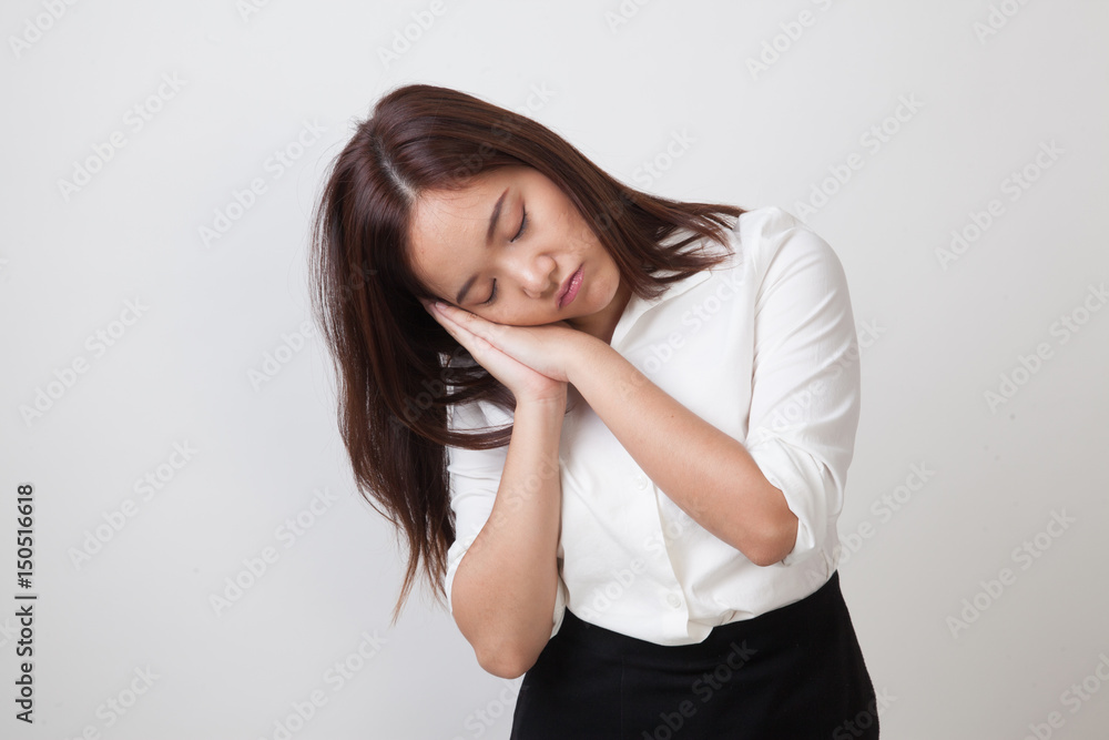 Beautiful young Asian woman with sleeping gesture. Beautiful young Asian woman with sleeping gesture.