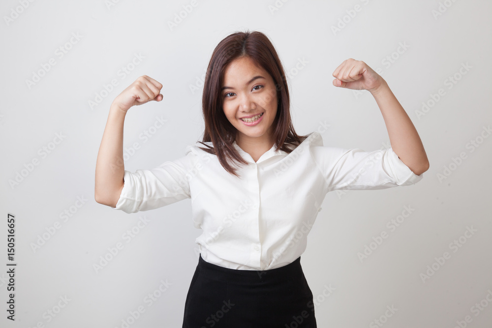 Beautiful young Asian woman flex bicep. Beautiful young Asian woman flex bicep.
