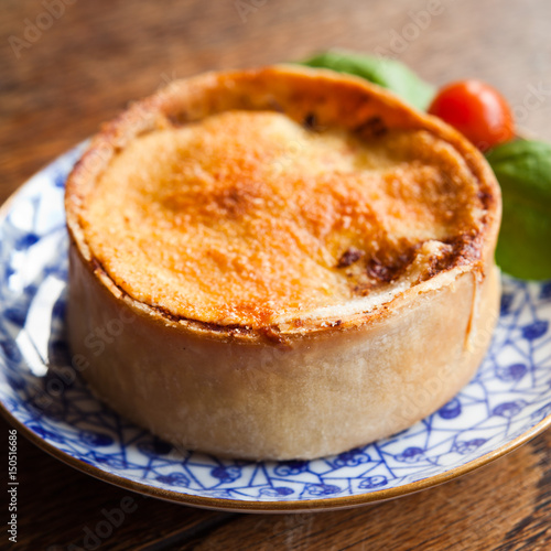 Scottish Pie - traditional with differend filings.Macaroni cheese pie, mutton pie, shell pie, mince pie, football pie, cheese and onion pie, chicken and mushrrom pie, cottage pie, curry pie, steak pie photo