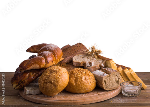 Bread and pastries on a wooden background