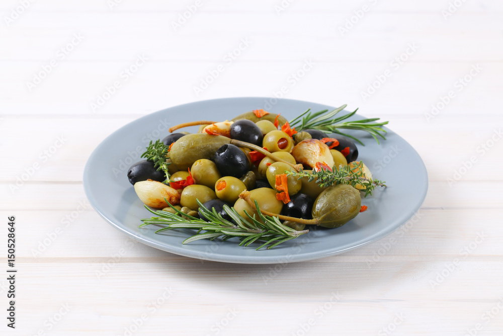 pickled olives, capers, caper berries and garlic pickled olives, capers, caper berries and garlic