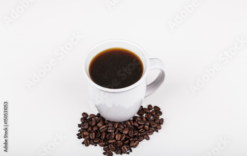 Coffee in White Cup with Beans