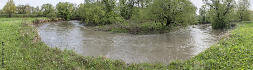 The panorama of the river in the meander of the river.