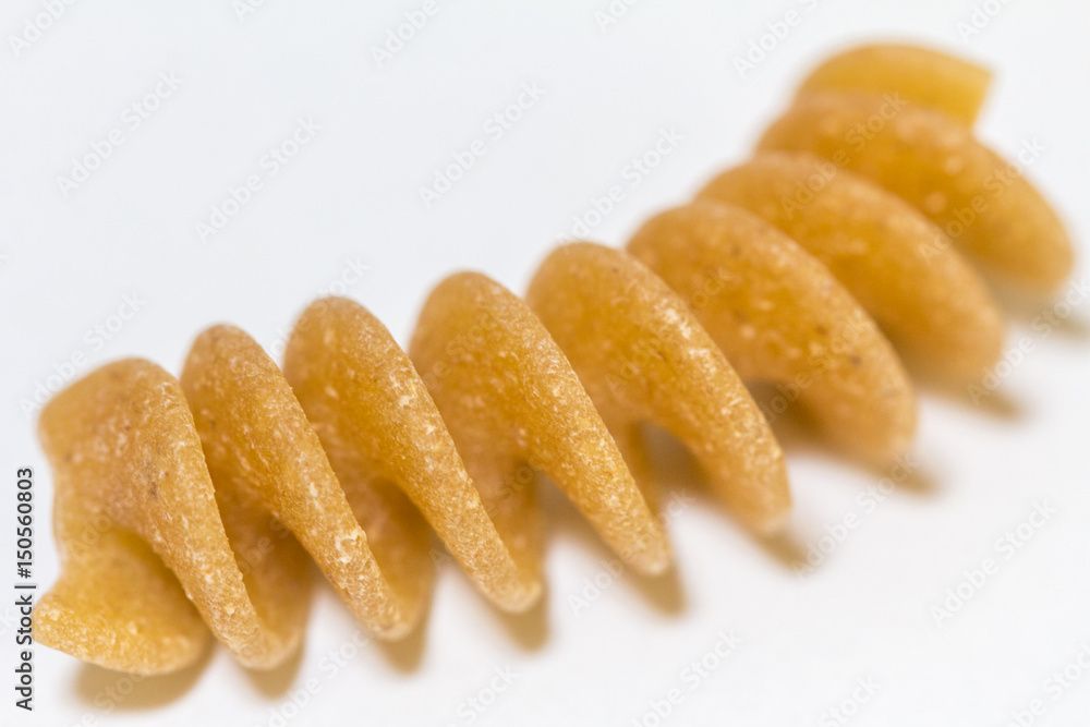 Fusilli pasta shape on a white background Fusilli pasta shape on a white background