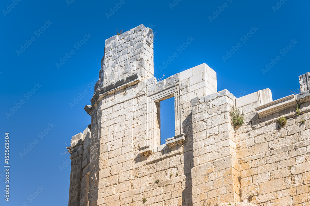 old ruin wall with blue sky