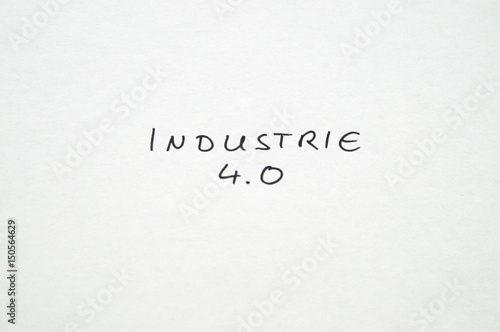 Industrie 4.0 (Industry 4.0) in handwriting on white background