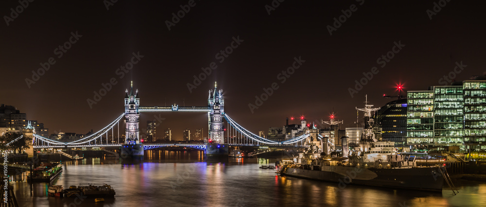 The Thames at night with the Tower Bridge and the HMS Belfast