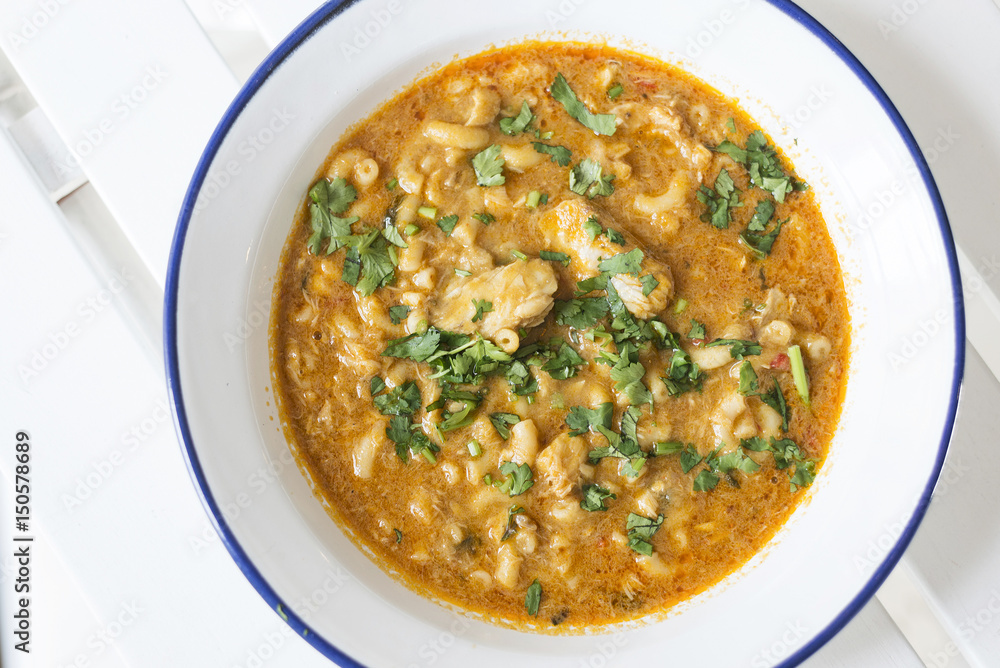 creamy spicy seafood fish soup with coriander creamy spicy seafood fish soup with coriander