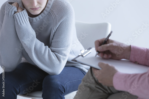 Girl during session with psychotherapist