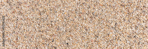 Fototapeta The pattern small pebbles stone as background