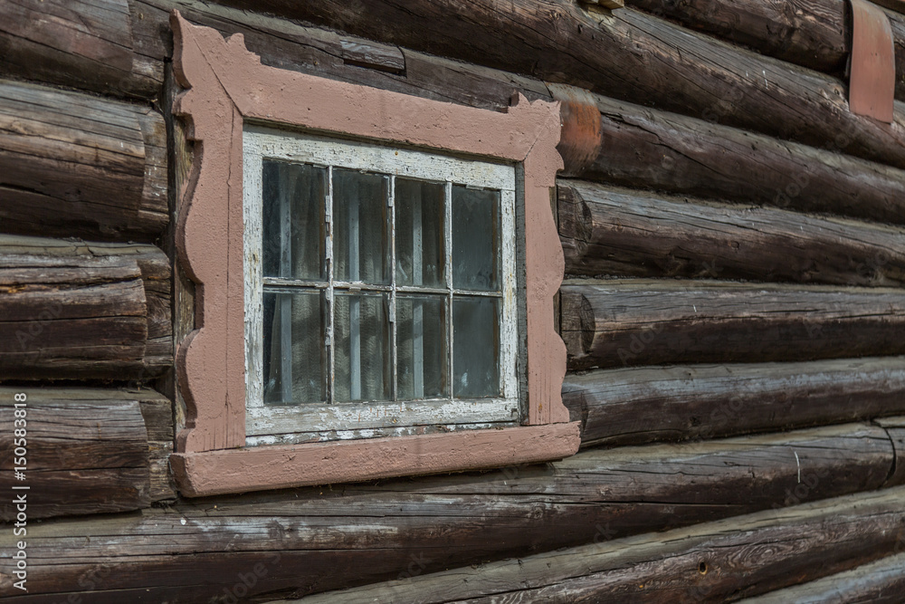 Window in old wooden rural house