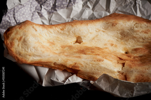 Georgian bread baked in clay oven . Shotis Puri.Fresh with a crispy crust photo