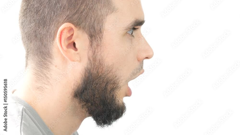 Profile of shocked bearded man face with open mouth, studio isolated on white background. Profile of shocked bearded man face with open mouth, studio isolated on white background.