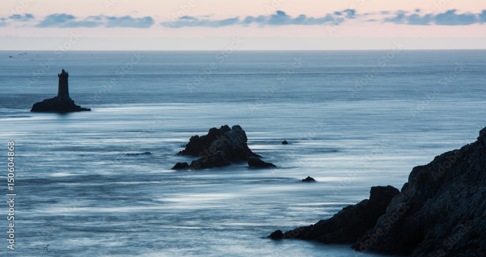 Fototapeta premium Lighthouse on Cape Sizun, Pointe du Raz. Brittany, France