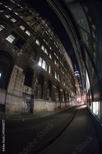 New York City's World Trade Center at night. Shot with a fisheye lens in a back alley during a Spring 2017 night.