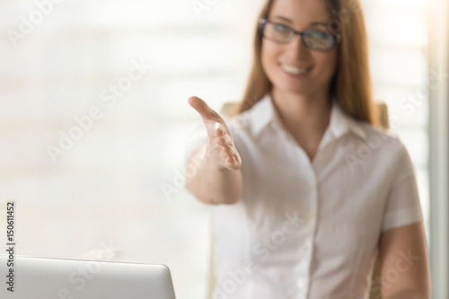 Smiling woman reaching out hand for handshake as a sign of a courtesy. Friendly businesswoman reaching agreement with partners. Relations of trust in business, successful partnership concept, close up Free Download Smiling woman reaching out hand for handshake as a sign of a courtesy. Friendly businesswoman reaching agreement with partners. Relations of trust in business, successful partnership concept, close up - GFXLoad