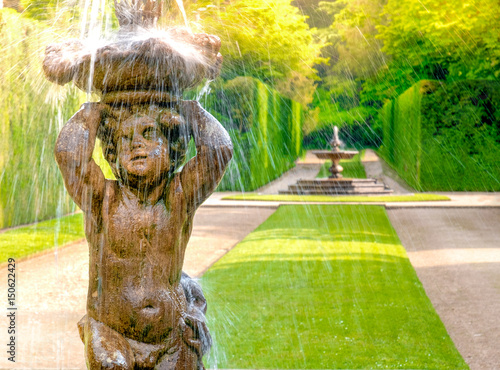 fountain statue child shower italian garden photo