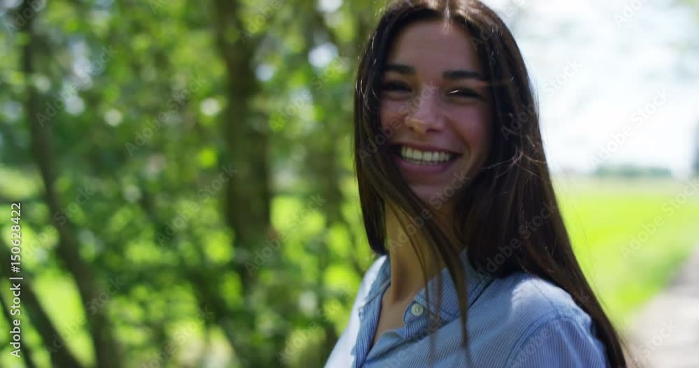 Portrait of a beautiful young girl, having fun and playing in the fresh air, in the background of nature. Concept: clean ecological air, healthy lifestyle, cleanliness, happiness and smile, fresh air. Portrait of a beautiful young girl, having fun and playing in the fresh air, in the background of nature. Concept: clean ecological air, healthy lifestyle, cleanliness, happiness and smile, fresh air.