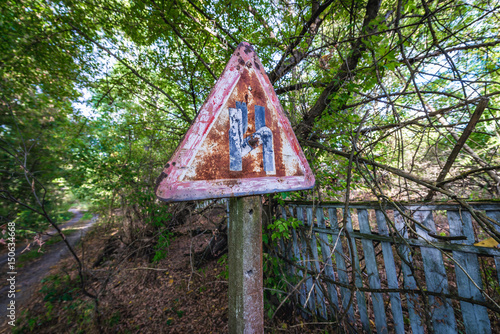 Sign in Krasne ghost village of Chernobyl Exclusion Zone, Ukraine
