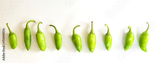 green peppers on white background 