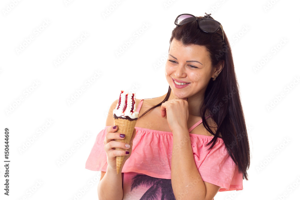 Woman in dress with sunglasses holding ice-cream Woman in dress with sunglasses holding ice-cream