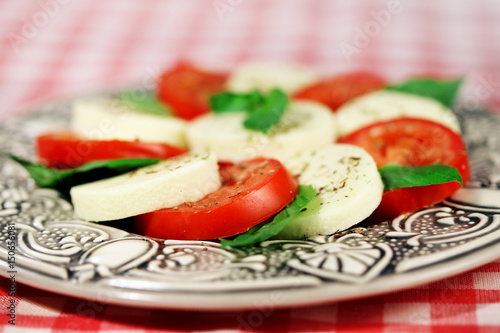 Italian cuisine - salad capreze photo