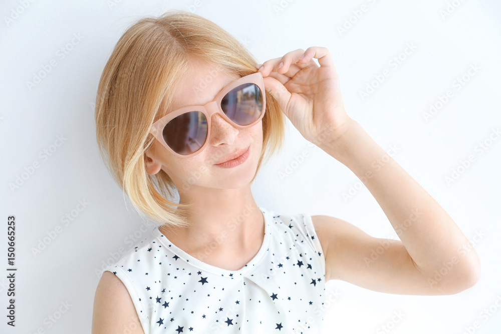 Portrait of attractive teenager girl in sunglasses on white background Portrait of attractive teenager girl in sunglasses on white background