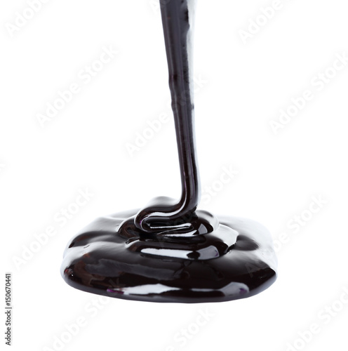 Delicious chocolate sauce on white background