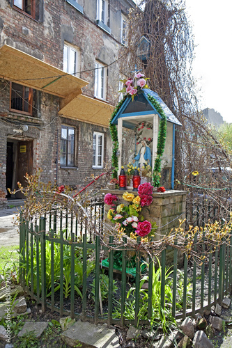 statue of Mary in a backyard in the Praga district