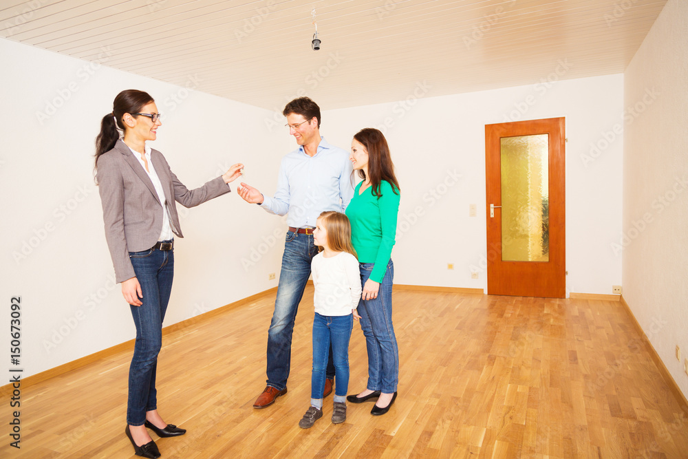 Realtor Giving Customers The Key To Their New Flat