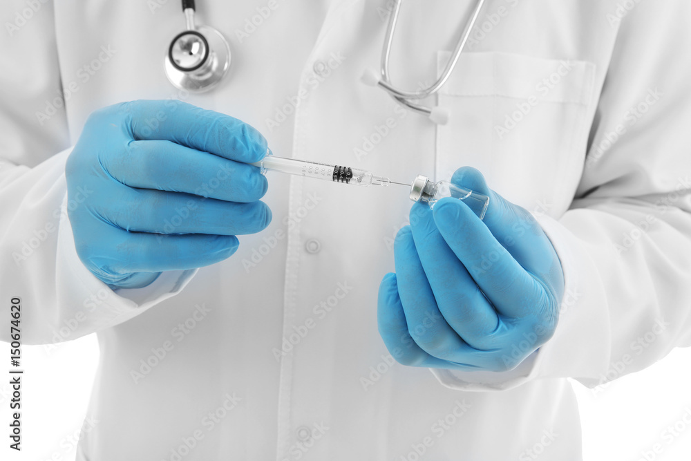 Doctor with syringe and medicine, closeup Doctor with syringe and medicine, closeup